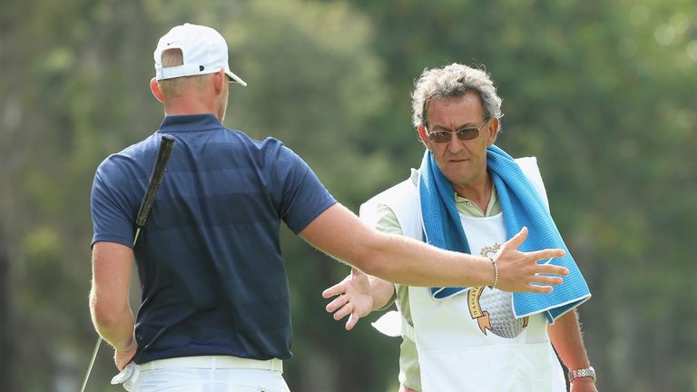 Joshua White of England is pictured with his caddie during the third round of the Trophee Hassan II at Royal Golf Dar Es Salam 