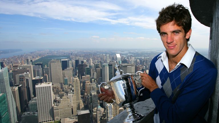 NEW YORK - SEPTEMBER 15: Juan Martin Del Potro the 2009 US Open Tennis Champion poses with the US Open trophy on a viewing deck at the Empire State Buildin