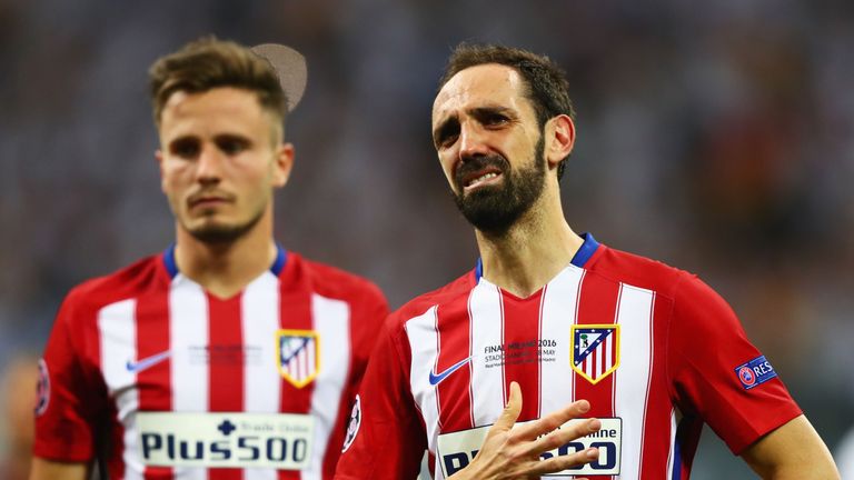 Juanfran of Atletico Madrid is dejected after missing a penalty in the Champions League final