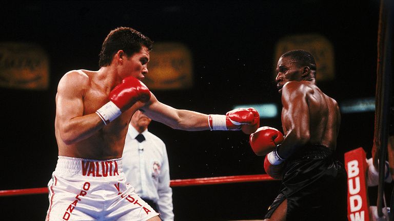 1989: Julio C Chavez lands a right hook during a fight against Mayweather. Mandatory Credit: Holly  Stein  /Allsport