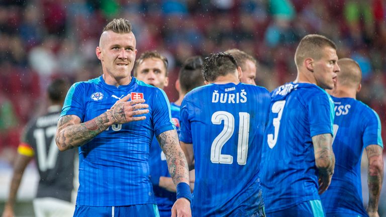 Juraj Kucka and his Slovakia team-mates celebate against Germany