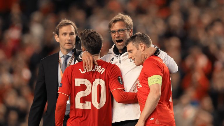 Liverpool manager Jurgen Klopp with Adam Lallana and James Milner after the final whistle v Villarreal, Europa League semi-final second leg