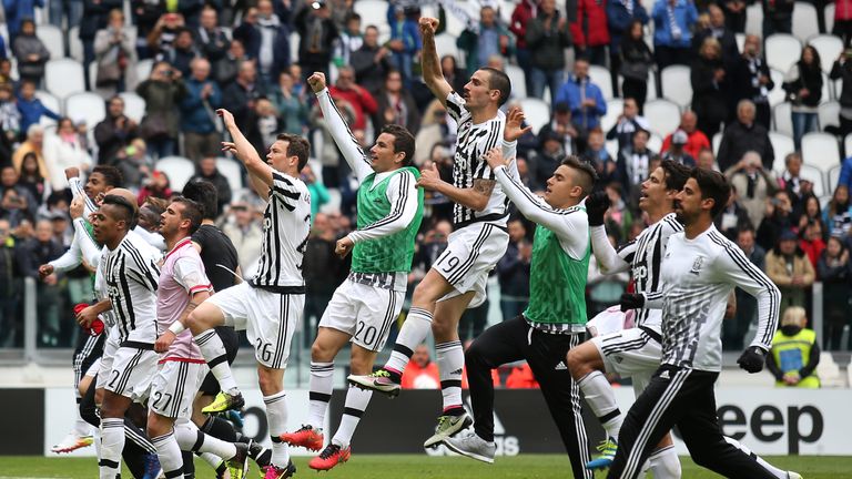 Juventus' players celebrate after winning the Italian Serie A football match Juventus Vs Carpi on May 1, 2016 at the "Juventus Stadium" in Turin