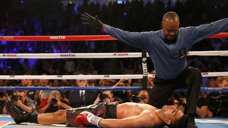 LAS VEGAS, NEVADA - MAY 07:  Amir Khan stays down after a knockout from Canelo Alvarez during the WBC middleweight title fight at T-Mobile Arena on May 7, 