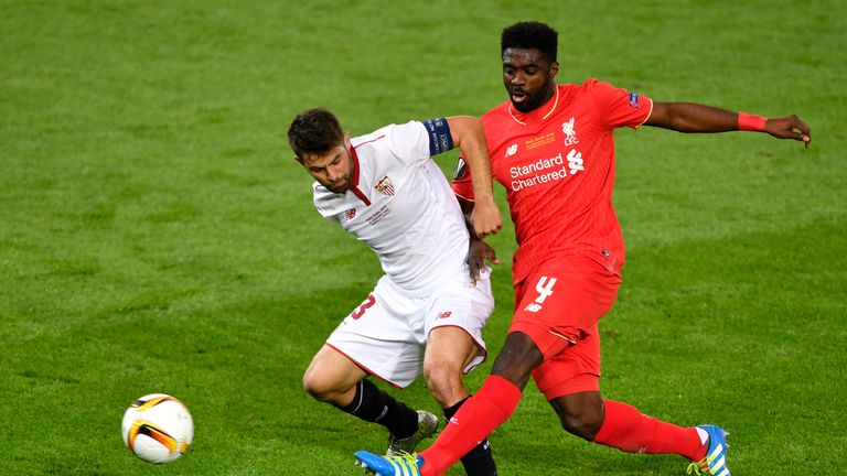 Liverpool's Ivorian defender Kolo Toure (R) vies with Sevilla's Spanish defender Coke during the UEFA Europa League final football match between Liverpool 