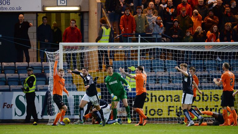 Dundee's Kosta Gadzhalov celebrates after making it 1-1.