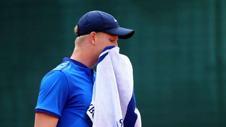 Kyle Edmund of Great Britain reacts during his second round match against John Isner at the French Open