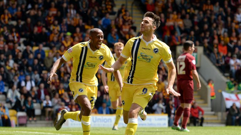 Millwall's Lee Gregory (right) celebrates scoring his side's first goal during the Sky Bet League One play off, first leg match at Valley Parade, Bradford