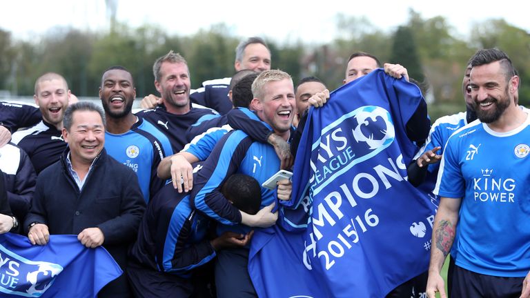 Leicester City players celebrate winning the Premier League title during a training session at their Belvoir Drive training ground