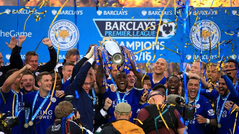 Wes Morgan and Claudio Ranieri lift the Premier League trophy