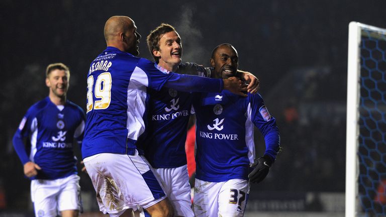 Andy King celebrates with Roman Bendner and Darius Vassell in 2010