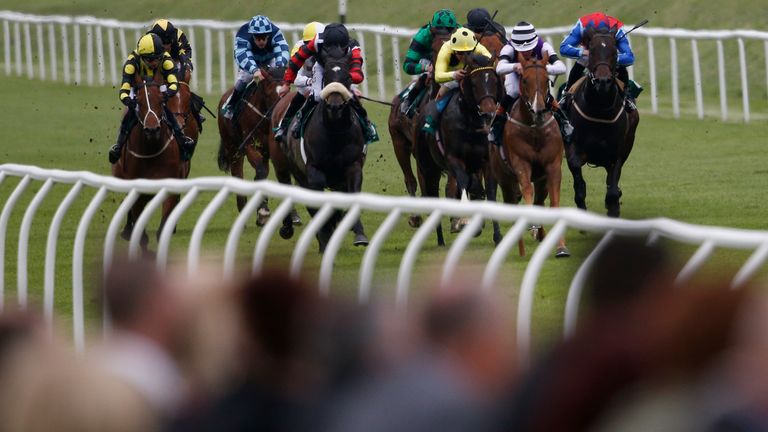 LINGFIELD, ENGLAND - MAY 25: Clifford Lee riding Felix Leiter (2R) win The martin Lawrence 60th Birthday celebration Handicap Stakes at Lingfield Park on M