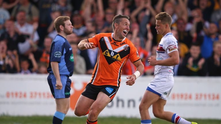 Luke Dorn celebrates scoring a try against Wakefield