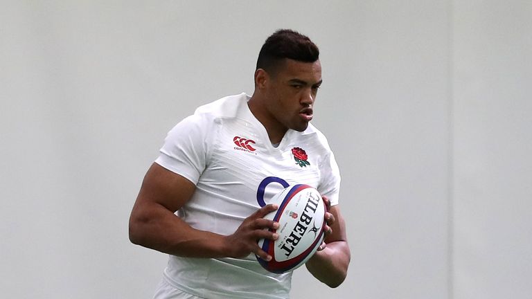 BAGSHOT, ENGLAND - MAY 27:  Luther Burrell runs with the ball during the England training session held at Pennyhill Park on May 27, 2016 in Bagshot, Englan