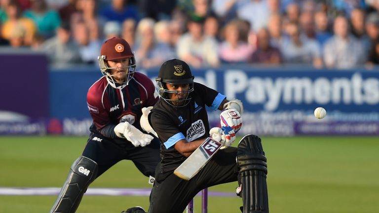 HOVE, ENGLAND - AUGUST 12:  Mahela Jayawardene of Sussex plays a scoop shot over wicketkeeper Ben Duckett of Northamptonshire during the NatWest T20 Blast 