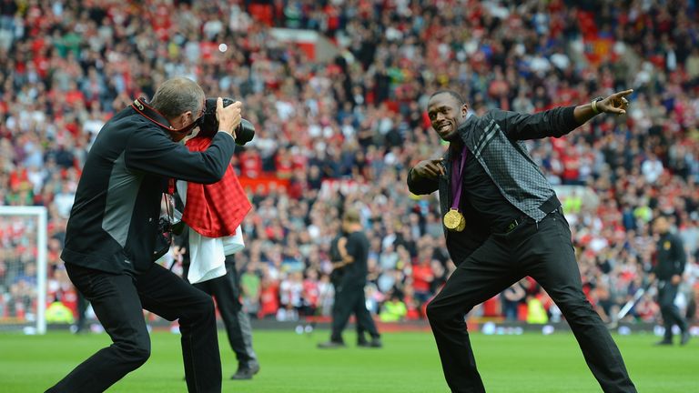 Usain Bolt shows off his gold at Old Trafford shortly after the London 2012 Olympics