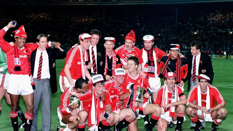 File photo dated 17-05-1990 of Scorer Lee Martin (centre) holding the FA Cup with his teammates after Manchester United's 1-0 victory over Crystal Palace