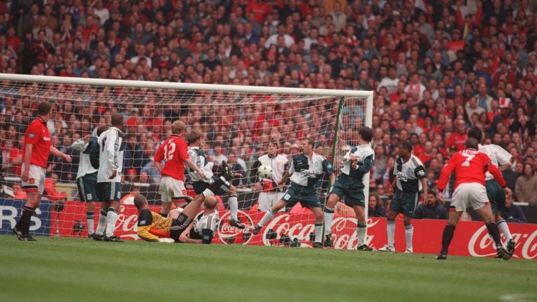11 May 1996:  Eric Cantona scores the wining goal to give Manchester United victory over Liverpool in the 1996 FA Cup Final