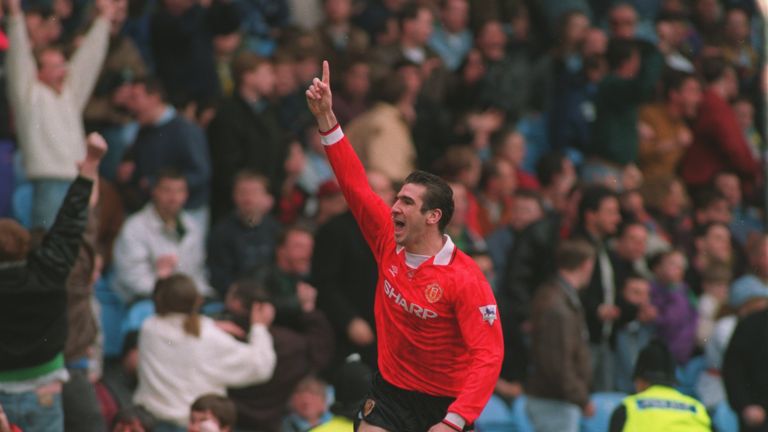 20 MAR 1993:  Eric Cantona celebrated scoring a derby goal for Manchester United against Manchester City