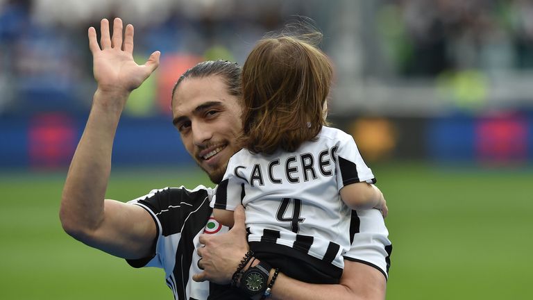 TURIN, ITALY - MAY 14:  Martin Caceres of Juventus FC with his children celebrates after beating UC Sampdoria 5-0 to win the Serie A Championships after th