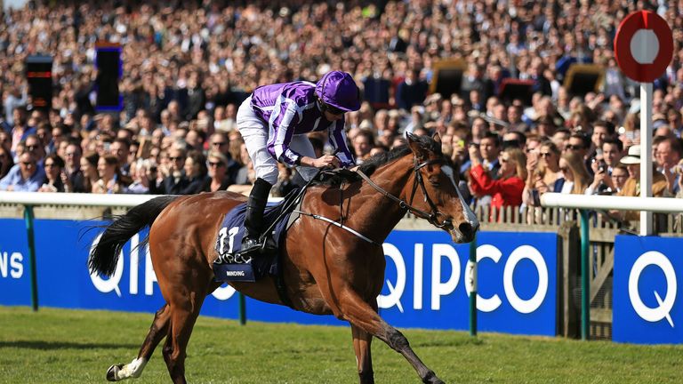 Minding ridden by Ryan Moore wins The QIPCO 1000 Guineas Stakes at Newmarket