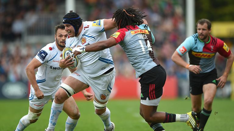 Mitch Lees of Exeter Chiefs is tackled by Marland Yarde of Harlequins 