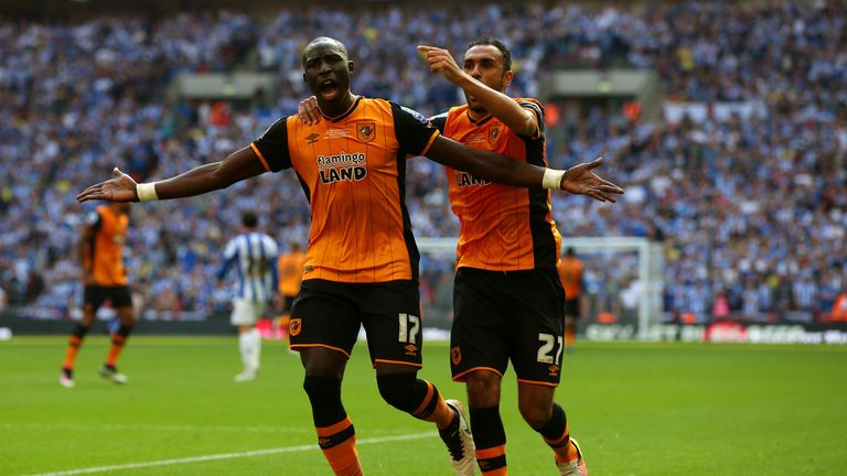 Mohamed Diame celebrates with Ahmed Elmohamady after opening the scoring for Hull against Sheffield Wednesday