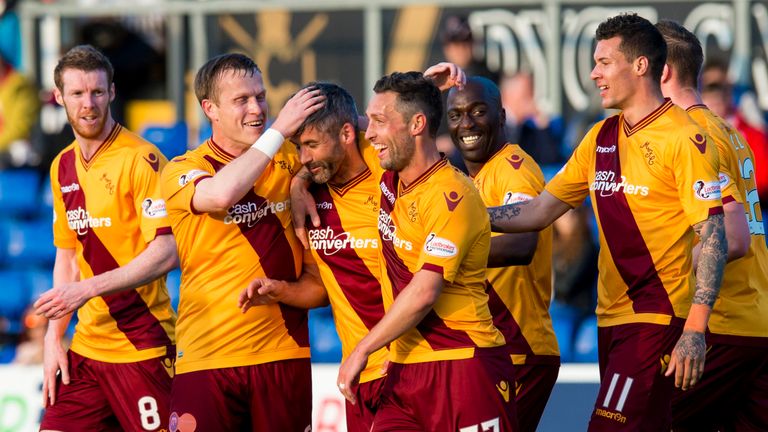 Motherwell's Keith Lasley (centre) celebrates his last minute goal