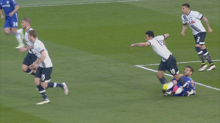 Cesc Fabregas appears to kick out at Moussa Dembele 