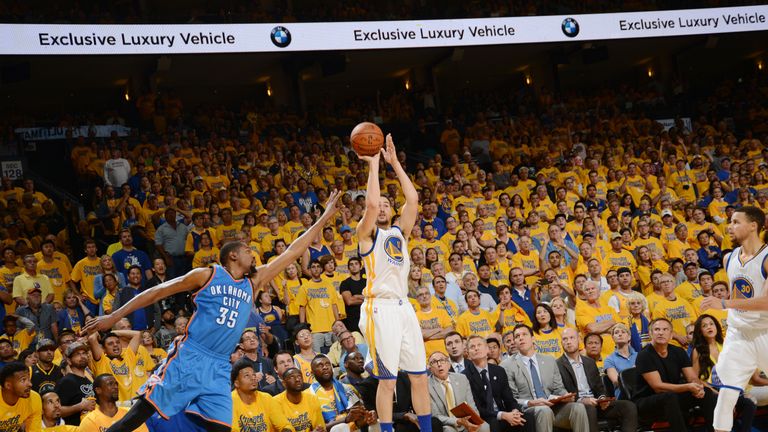 Klay Thompson #11 of the Golden State Warriors shoots a 3-pointer