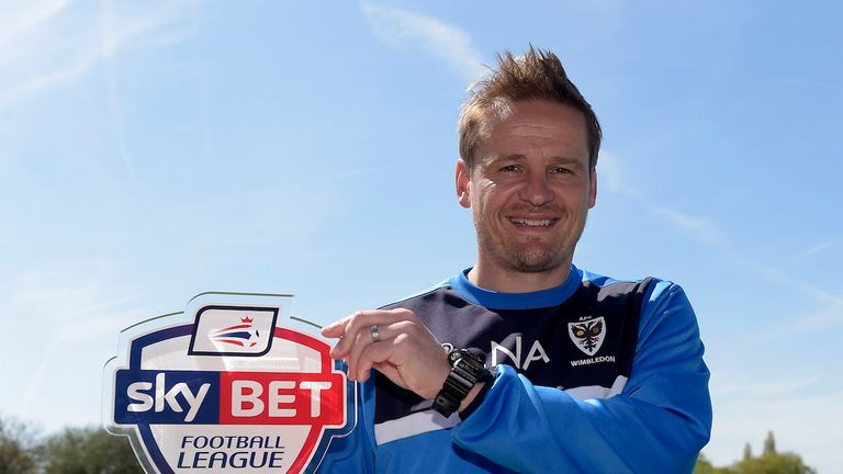 Neal Ardley of AFC Wimbledon with his Sky Bet Manager of the Month for League Two 