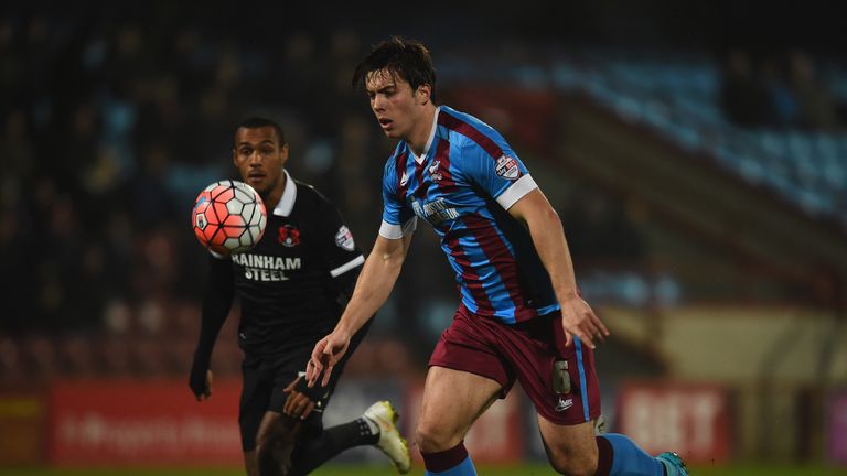 SCUNTHORPE, ENGLAND - DECEMBER 15:  Niall Canavan of Scunthorpe United battes with Jay Simpson of Leyton Orient during The Emirates FA Cup Second Round Rep