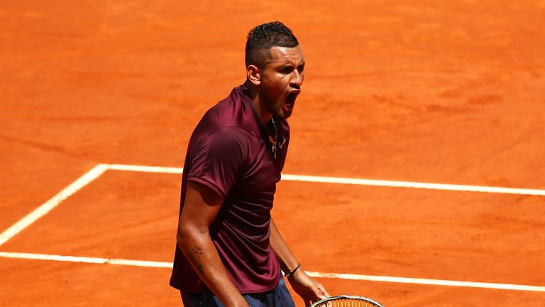 Nick Kyrgios of Australia celebrates winning the first set during his straight sets victory against Stanislas Wawrinka of Switzerl