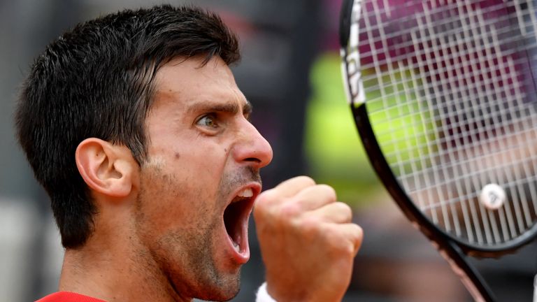 Serbia's Novak Djokovic reacts against Spanish Rafael Nadal during the ATP Tennis Open tournament at the Foro Italico, on May 13, 2016 in Rome. / AFP / TIZ