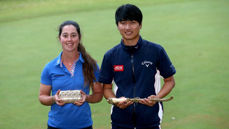 RABAT, MOROCCO - MAY 08:   Nuria Iturrios of Spain, winner of the 2016 Lalla Meryem Cup, and Jeunghun Wang of Korea pose with their trophies at the Trophee