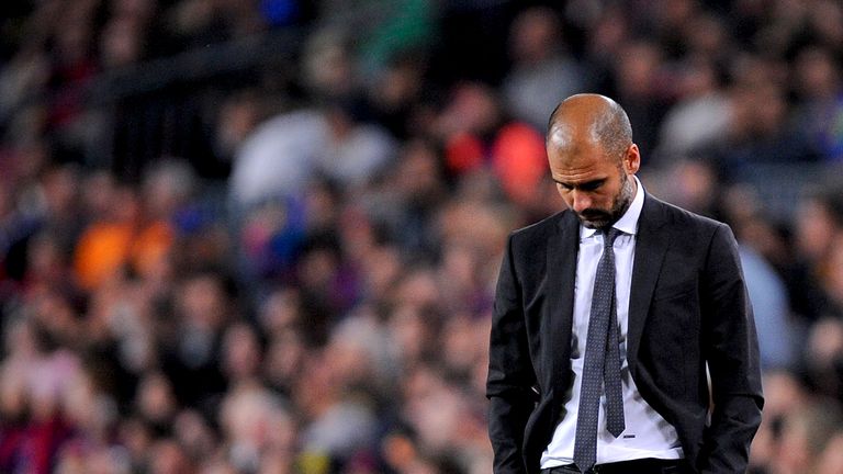 BARCELONA, SPAIN - APRIL 21:  Head coach Josep Guardiola of FC Barcelona reacts dejected during the La Liga match between FC Barcelona and Real Madrid at C
