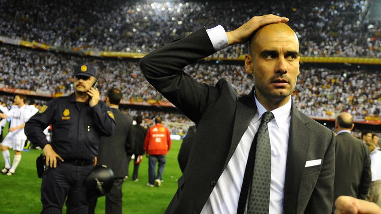 Barcelona's coach Pep Guardiola reacts after the Spanish Cup final match Real Madrid against Barcelona at the Mestalla stadium in Valencia on April 20, 201