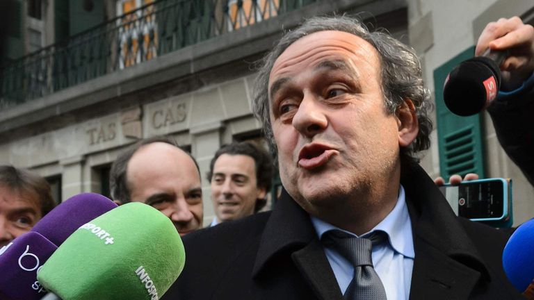 UEFA president Michel Platini answers journalists' questions as he leaves the Court of Arbitration for Sport (CAS)