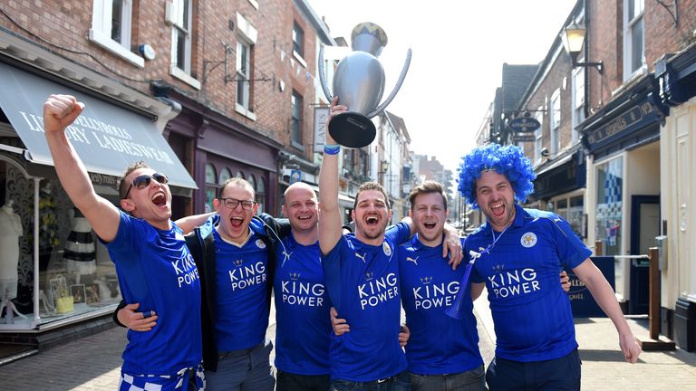 Leicester City supporters pose for photographs prior to the match between Leicester City and Everton 