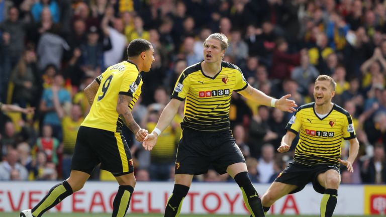 Sebastian Prodl (C) of Watford celebrates scoring his team's first goal 