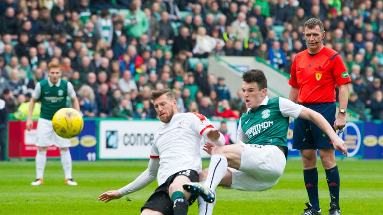 Hibernian's John McGinn (centre) scores his side's first goal against Raith Rovers