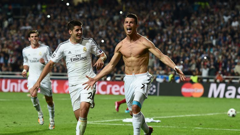 LISBON, PORTUGAL - MAY 24:  Cristiano Ronaldo of Real Madrid celebrates after scoring their fourth goal from the penalty spot during the UEFA Champions Lea