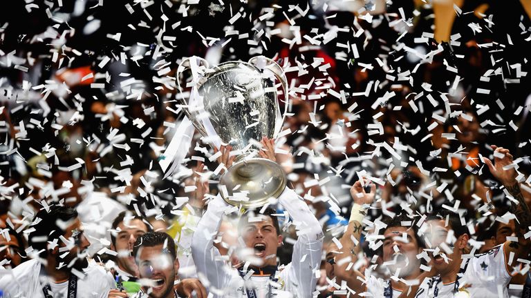 LISBON, PORTUGAL - MAY 24: Cristiano Ronaldo of Real Madrid lifts the Champions league trophy during the during the UEFA Champions League Final between Rea