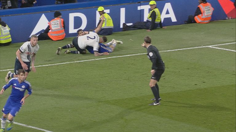 Diego Costa and Kyle Walker get tangled up after colliding in Tottenham's penalty area