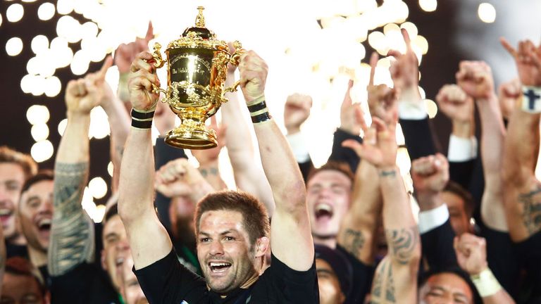 New Zealand skipper Richie McCaw lifts the Webb Ellis Cup after the win over Australia
