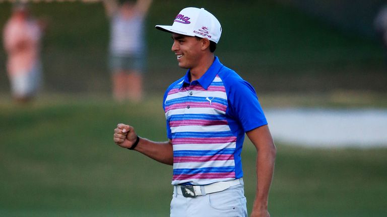 Rickie Fowler celebrates as he wins the playoff in the final round of THE PLAYERS Championship at the TPC Sawgrass Stadium