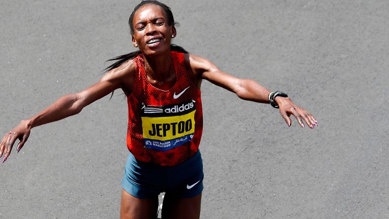 Rita Jeptoo, pictured celebrating her victory in Boston in 2014, is currently banned from competing