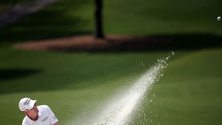 Roberto Castro hits from a green side bunker on the fifth hole during the third round of the Wells Fargo Championship at Quail Hol