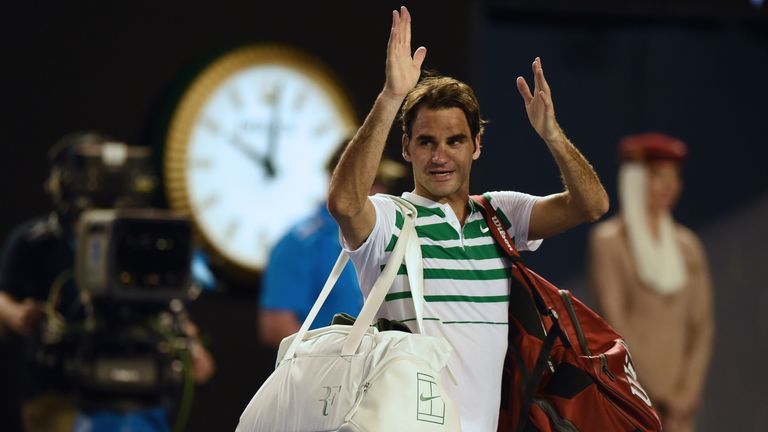 Roger Federer waves to the crowd