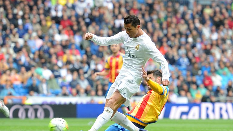 Cristiano Ronaldo of Real Madrid scores his team's third goal against Valencia